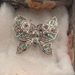 Silver butterfly brooch/pin. Aqua and lavender stones.